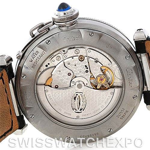 The image shows the case back of a Cartier Pasha Men's Stainless Steel Silver Dial Men's Stainless Steel Silver Dial watch, with its intricate movement and inner mechanism visible.