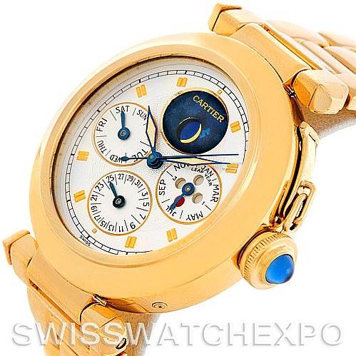 The image shows a close-up angle of a gold Cartier Pasha MG222080 Men's Yellow Gold Silver Dial MG222080 Men's Yellow Gold Silver Dial watch, highlighting its face, crown, and part of the bracelet.