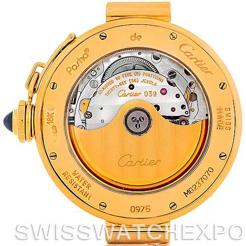 The image shows the back view of a Cartier Pasha MG222080 Men's Yellow Gold Silver Dial MG222080 Men's Yellow Gold Silver Dial watch, highlighting its movement and intricate inner mechanisms.