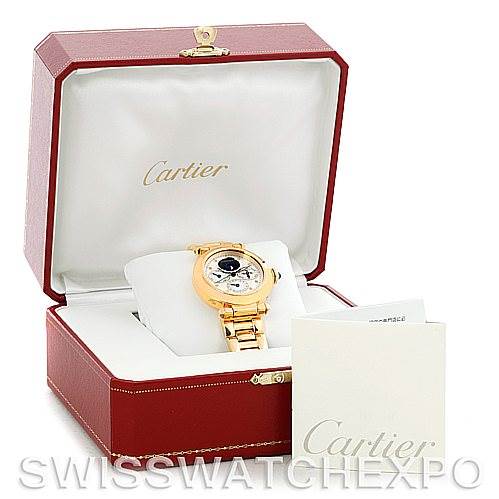 The image shows a Cartier Pasha MG222080 Men's Yellow Gold Silver Dial MG222080 Men's Yellow Gold Silver Dial watch at an angled view in an open red Cartier box, with accompanying documents.