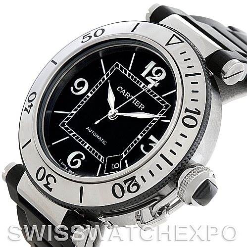 The image shows the Pasha de Cartier watch from an angled view highlighting the bezel, black dial, crown, and strap.