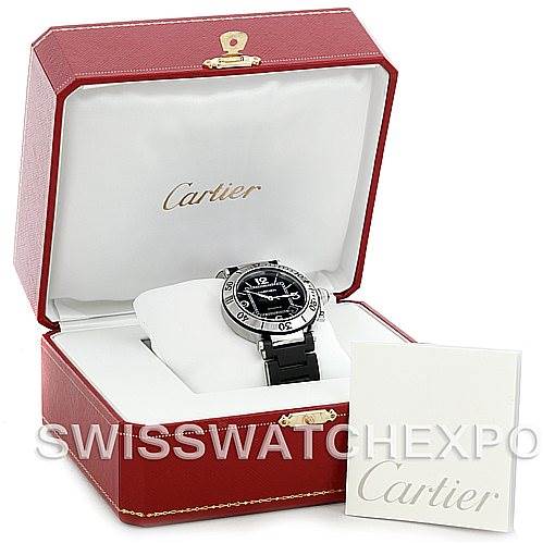 The Cartier Pasha W31077U2 Men
s Stainless Steel Black Dial W31077U2 Men
s Stainless Steel Black Dial watch is shown in an open red box with a white interior and an accompanying Cartier booklet.