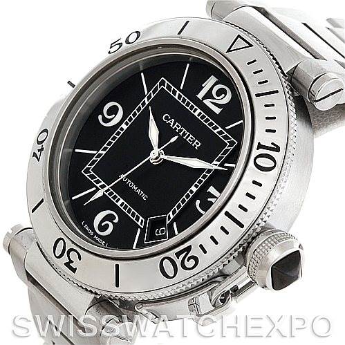 The image shows a close-up of the Cartier Pasha W31077M7 Men
s Stainless Steel Black Dial W31077M7 Men
s Stainless Steel Black Dial watch face, bezel, crown, and part of the bracelet at an angle.