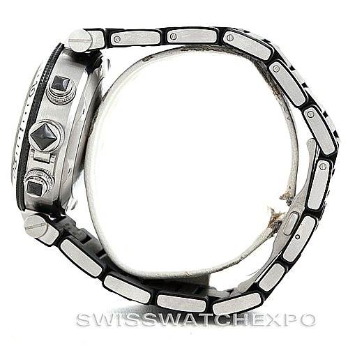 The image shows a side view of the Cartier Pasha W31088U2 Men
s Stainless Steel Black Dial W31088U2 Men
s Stainless Steel Black Dial watch, highlighting its case, crown, and bracelet.