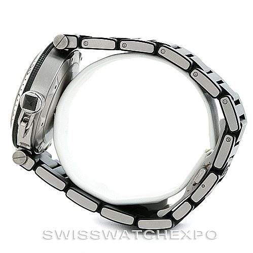 This image shows a side view of the Cartier Pasha W31077U2 Men
s Stainless Steel Black Dial W31077U2 Men
s Stainless Steel Black Dial watch, highlighting its case, crown, and metal bracelet.