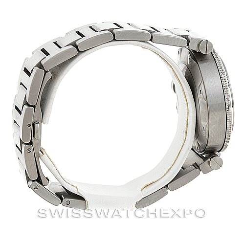 The image shows a side profile of a Cartier Pasha W31077M7 Men's Stainless Steel Black Dial W31077M7 Men's Stainless Steel Black Dial watch, highlighting the bracelet and case side.