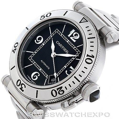 The image shows a close-up of the Cartier Pasha W31077M7 Men's Stainless Steel Black Dial W31077M7 Men's Stainless Steel Black Dial watch, highlighting the bezel, crown, and part of the bracelet.