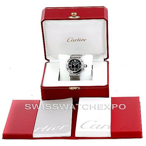 The image shows a Cartier Pasha W31077M7 Men's Stainless Steel Black Dial W31077M7 Men's Stainless Steel Black Dial watch in a red box, accompanied by booklets and documentation displayed in front.