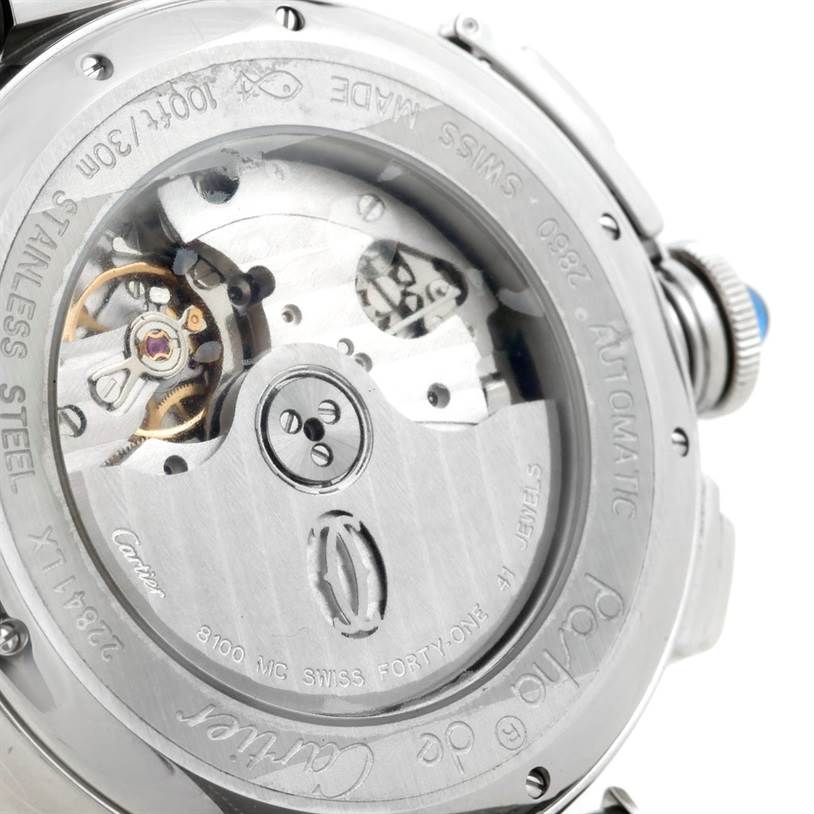 The image shows the back view of the Cartier Pasha W3103055 Men
s Stainless Steel Silver Dial W3103055 Men
s Stainless Steel Silver Dial watch, highlighting its automatic movement and internal mechanics.