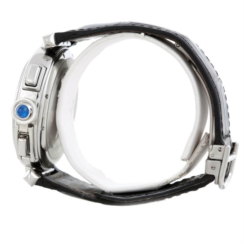 The image shows a side view of the Cartier Pasha W3103055 Men
s Stainless Steel Silver Dial W3103055 Men
s Stainless Steel Silver Dial watch, highlighting the crown with a blue cabochon and leather strap.