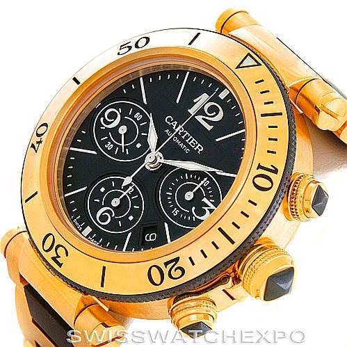 This image shows a close-up angle of the Cartier Pasha W31088U2 Men's Yellow Gold Black Dial W31088U2 Men's Yellow Gold Black Dial model watch, highlighting its gold bezel, black dial, and crown with pushers.