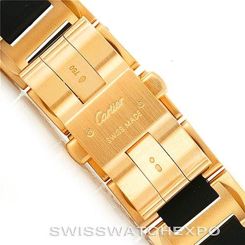 This image shows the gold clasp and part of the bracelet of a Cartier Pasha W31088U2 Men's Yellow Gold Black Dial W31088U2 Men's Yellow Gold Black Dial watch, with a focus on the "Cartier Swiss Made" engraving.