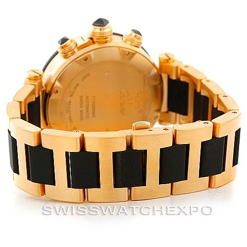 The image shows the back view of a Cartier Pasha W31088U2 Men's Yellow Gold Black Dial W31088U2 Men's Yellow Gold Black Dial model watch, highlighting its gold case and black leather strap.