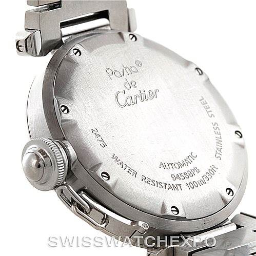 The image shows the back view of a Cartier Pasha Stainless Steel Silver Dial Stainless Steel Silver Dial watch, highlighting its case back and part of the metal bracelet.