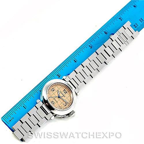 This image shows a top-down view of a Cartier Pasha W31023M7 Men's Stainless Steel Pink Dial W31023M7 Men's Stainless Steel Pink Dial watch with a metal bracelet, placed beside a ruler for scale.