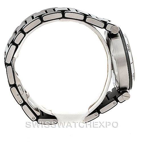 The image shows a side view of the Cartier Pasha W31077U2 Men
s Stainless Steel Black Dial W31077U2 Men
s Stainless Steel Black Dial watch, highlighting the bezel, crown, and metal bracelet.