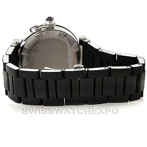 The image shows the back view of a Pasha model Cartier watch, highlighting its stainless steel case and black strap.