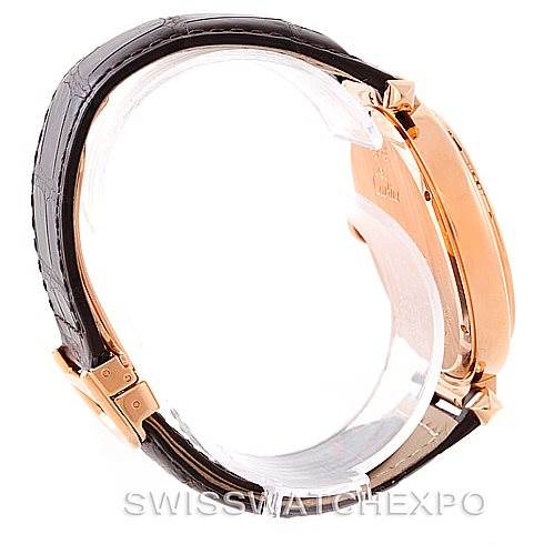 The image shows a Cartier Pasha W3019051 Men
s Rose Gold Silver Dial W3019051 Men
s Rose Gold Silver Dial model watch from the side, highlighting its case, crown, and leather strap.