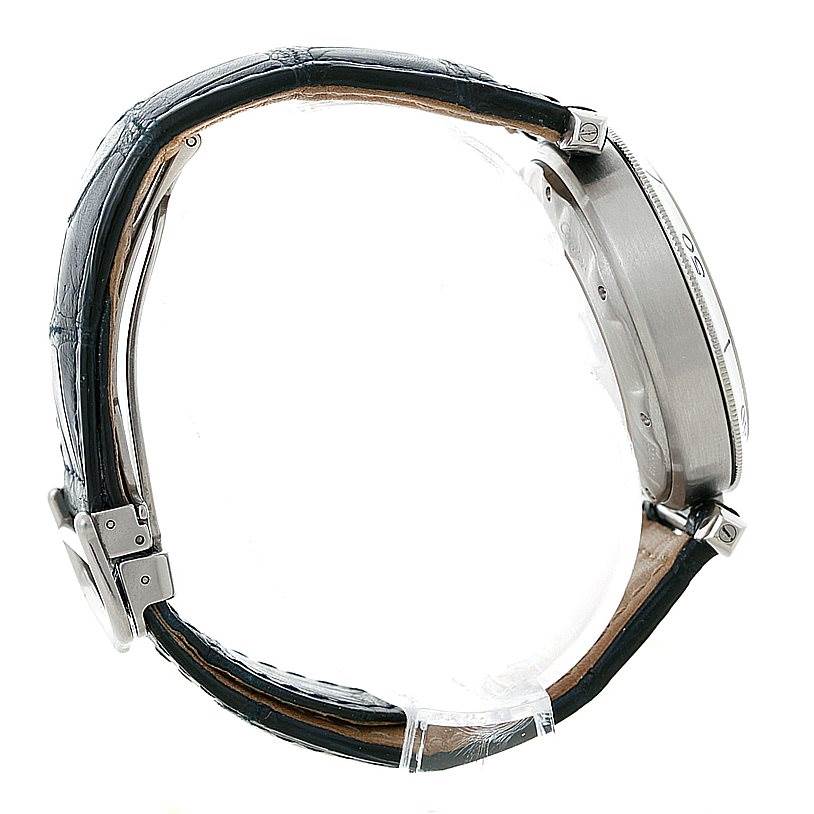 This image shows a side profile of the Cartier Pasha W3103055 Men's Stainless Steel Silver Dial W3103055 Men's Stainless Steel Silver Dial watch, highlighting its case, bezel, and leather strap.