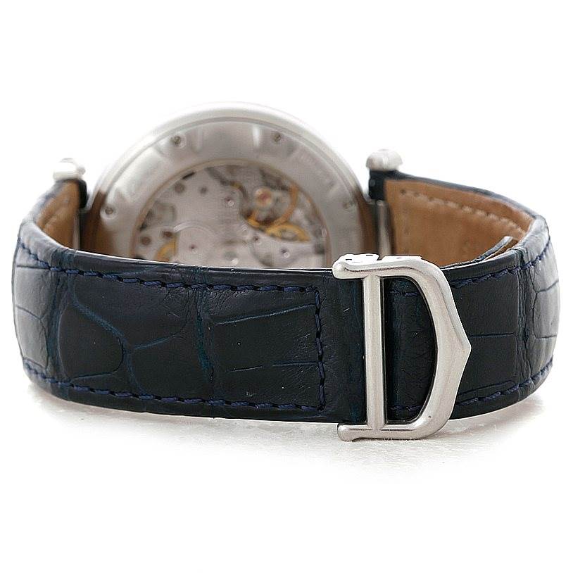 The image shows the back view of a Cartier Pasha W3103055 Men's Stainless Steel Silver Dial W3103055 Men's Stainless Steel Silver Dial watch, highlighting the movement and leather strap with its buckle.