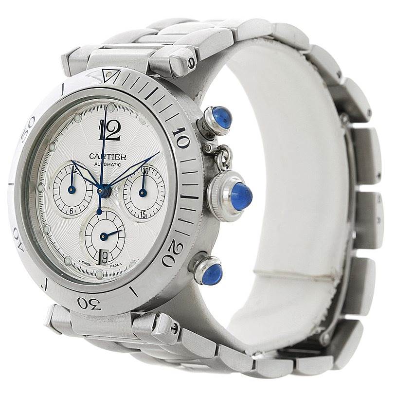 The image shows a Cartier Pasha W31030H3 Men's Stainless Steel Silver Dial W31030H3 Men's Stainless Steel Silver Dial model watch from an angled side view, highlighting the bezel, dial, and crown.