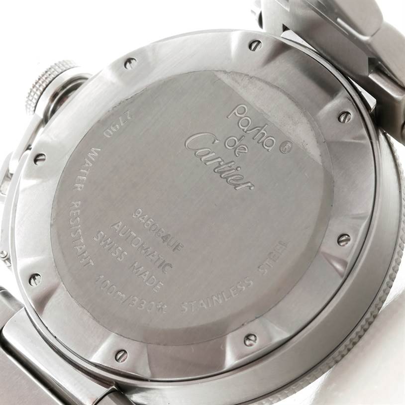 This image shows the back case of a Cartier Pasha W31080M7 Men
s Stainless Steel Silver Dial W31080M7 Men
s Stainless Steel Silver Dial watch at an angle, displaying engravings and the watch
s specifications.