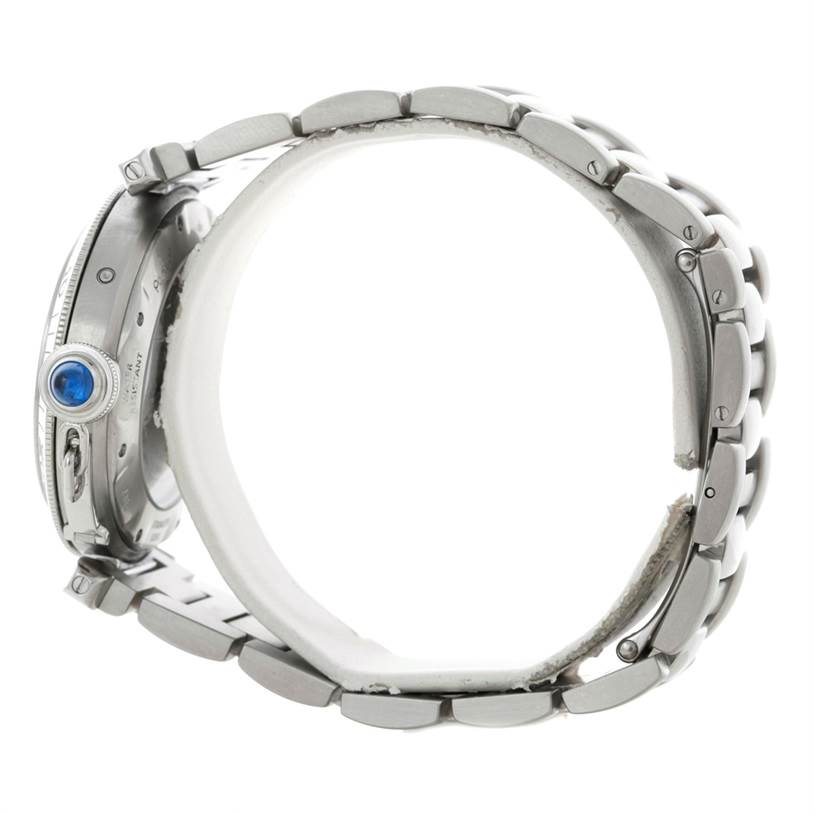 The image shows a side view of the Cartier Pasha W31037H3 Men
s Stainless Steel Silver Dial W31037H3 Men
s Stainless Steel Silver Dial watch, highlighting the crown with a blue cabochon and the metal bracelet.