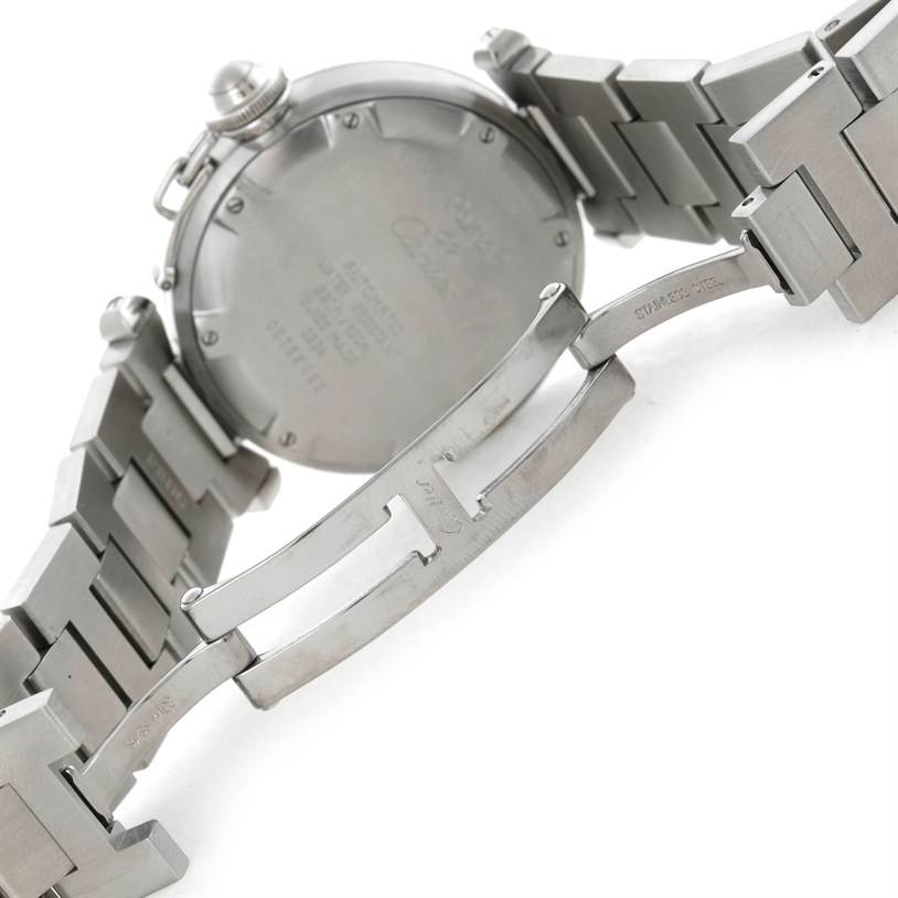 The image shows the back of a Cartier Pasha W31043M7 Stainless Steel Black Dial W31043M7 Stainless Steel Black Dial watch, focusing on the stainless steel case back and bracelet clasp.