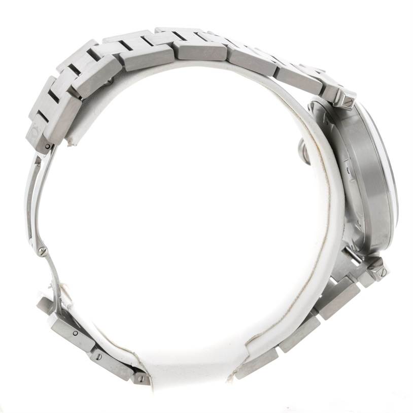 The image shows the side view of a Cartier Pasha W31043M7 Stainless Steel Black Dial W31043M7 Stainless Steel Black Dial watch focusing on the metal band and case.