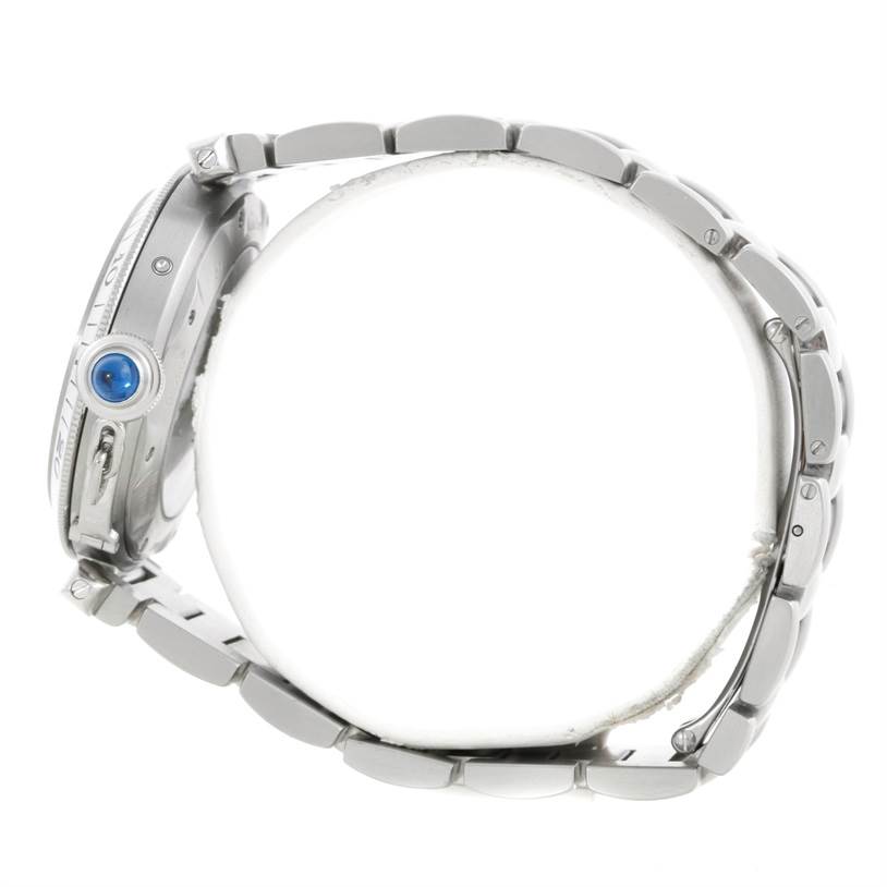 This image shows a side view of the Cartier Pasha W31037H3 Men
s Stainless Steel Silver Dial W31037H3 Men
s Stainless Steel Silver Dial watch, highlighting its crown with a blue cabochon and the metal bracelet.