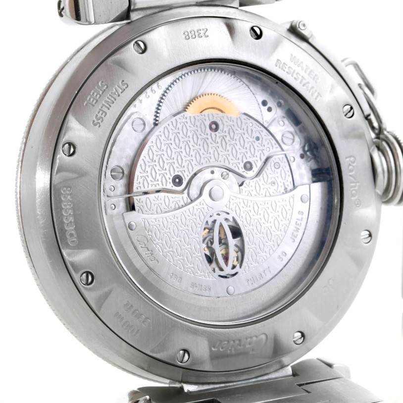 The image shows a close-up of the case back of a Cartier Pasha W31037H3 Men
s Stainless Steel Silver Dial W31037H3 Men
s Stainless Steel Silver Dial watch, highlighting its movement and internal mechanisms.