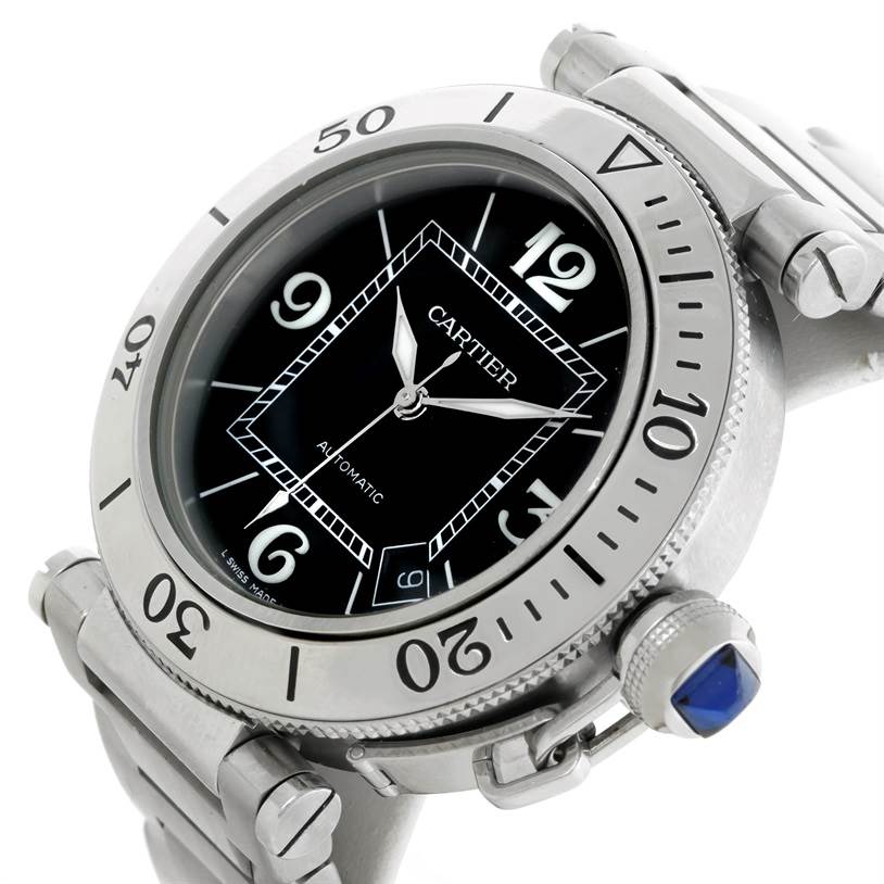The image shows a close-up angle of the Cartier Pasha W31077M7 Men
s Stainless Steel Black Dial W31077M7 Men
s Stainless Steel Black Dial watch, highlighting the bezel, dial, and crown with a blue cabochon.