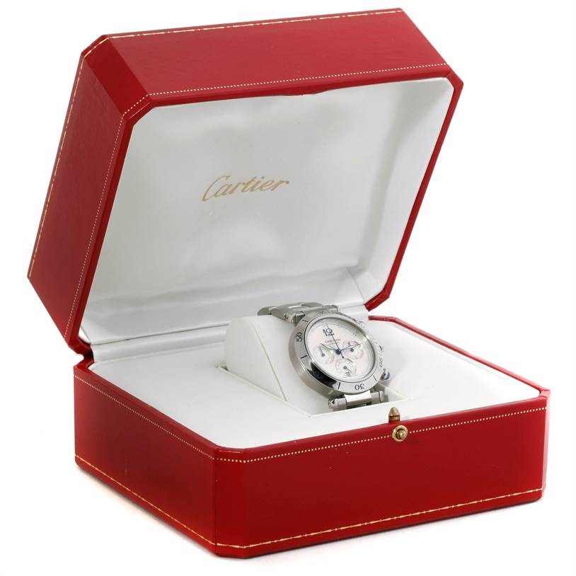 The Cartier Pasha W31030H3 Men's Stainless Steel Silver Dial W31030H3 Men's Stainless Steel Silver Dial watch is shown at an angled top-front view, inside its open red presentation box.