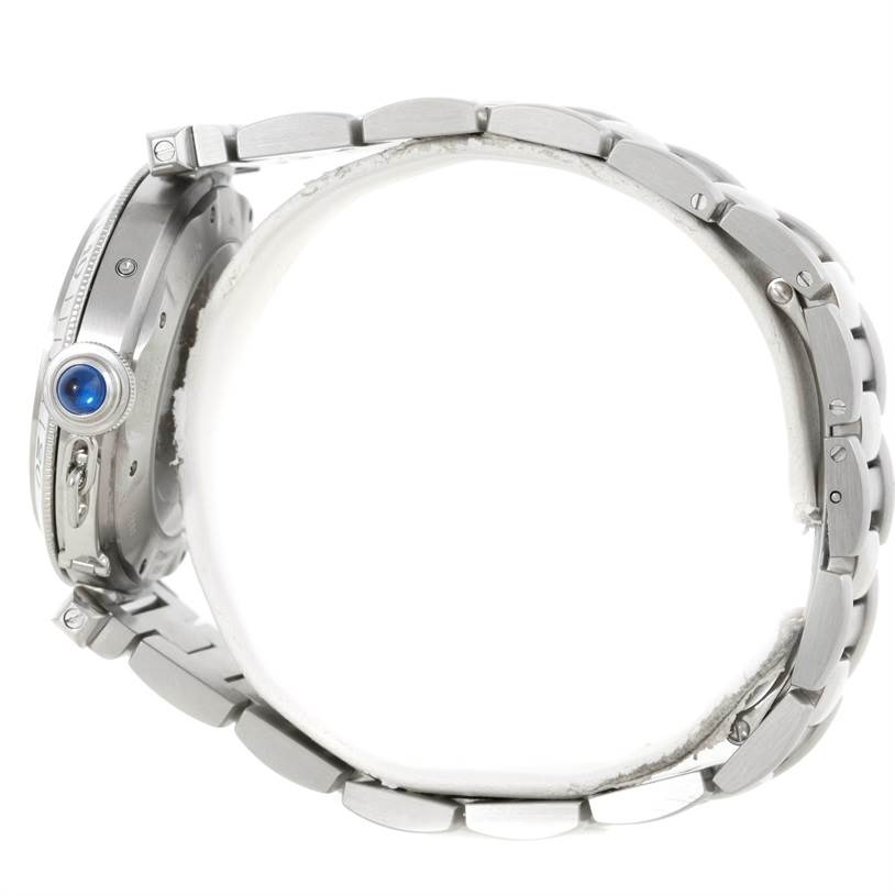 The image shows a side view of the Cartier Pasha W31037H3 Men
s Stainless Steel Silver Dial W31037H3 Men
s Stainless Steel Silver Dial watch, highlighting the watch case, crown, and part of the metal bracelet band.