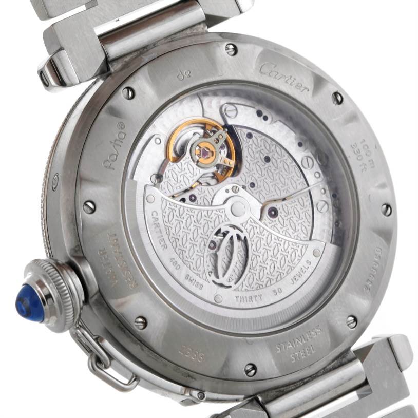 The image shows the back view of a Cartier Pasha W31037H3 Men
s Stainless Steel Silver Dial W31037H3 Men
s Stainless Steel Silver Dial watch, highlighting its movement and intricate mechanics.