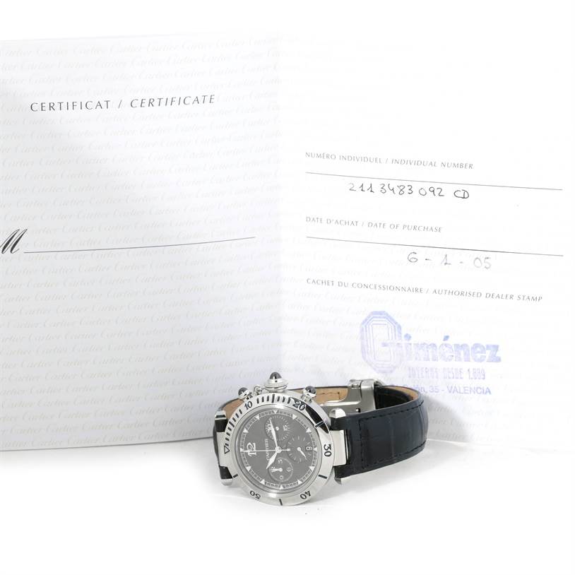 The image shows a Cartier Pasha W3105155 Men's Stainless Steel Grey Dial W3105155 Men's Stainless Steel Grey Dial watch from a slight side angle, accompanied by its certificate and dealer stamp.