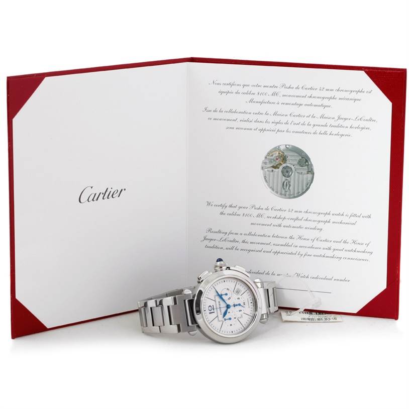 The Cartier Pasha W31085M7 Men's Stainless Steel Silver Dial W31085M7 Men's Stainless Steel Silver Dial watch is shown with its bracelet laid flat, accompanied by its certificate and documentation.