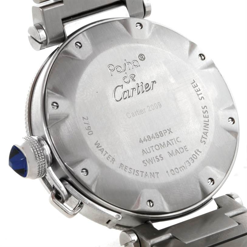 This image shows the backside of a Cartier Pasha W31080M7 Men
s Stainless Steel Silver Dial W31080M7 Men
s Stainless Steel Silver Dial model watch, highlighting its engravings and stainless steel casing.