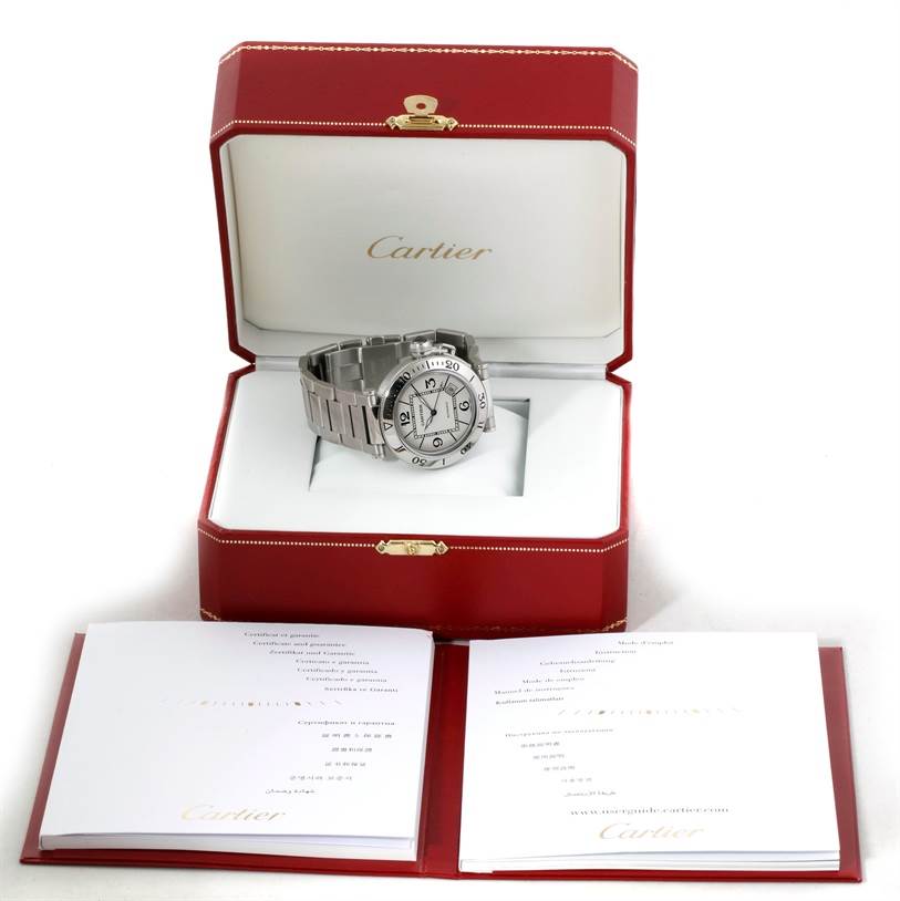 The Cartier Pasha W31080M7 Men
s Stainless Steel Silver Dial W31080M7 Men
s Stainless Steel Silver Dial watch is displayed head-on in an open red box with accompanying documents.
