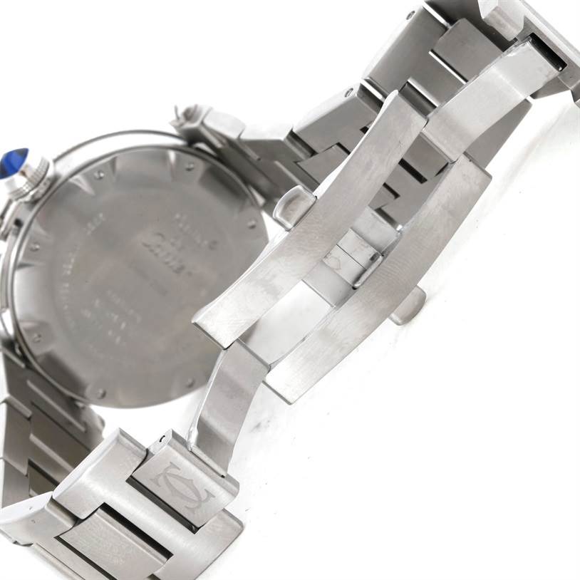 The image shows the back case and partially open clasp of a Cartier Pasha W31080M7 Men
s Stainless Steel Silver Dial W31080M7 Men
s Stainless Steel Silver Dial model watch in a metallic finish.