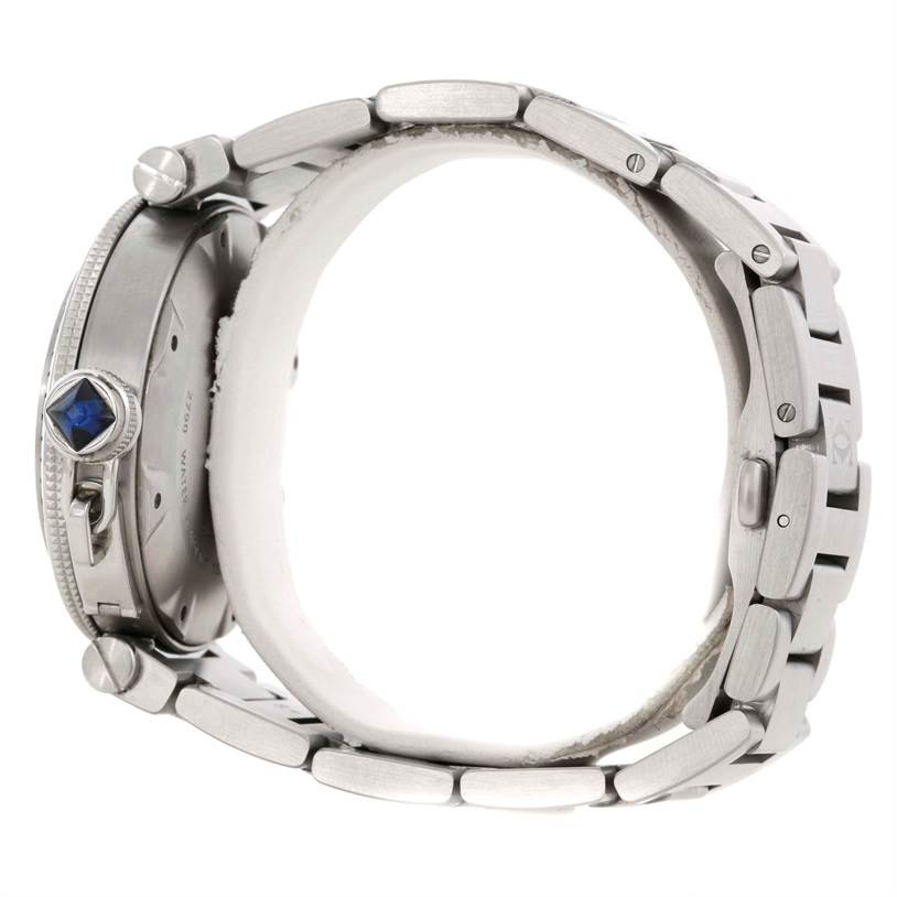 This side view shows the metal bracelet and blue crown of the Cartier Pasha W31080M7 Men's Stainless Steel Silver Dial W31080M7 Men's Stainless Steel Silver Dial watch.