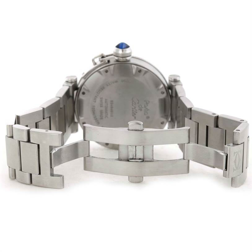 The image shows the backside and clasp of a Cartier Pasha W31080M7 Men's Stainless Steel Silver Dial W31080M7 Men's Stainless Steel Silver Dial watch with its metal bracelet partially open.