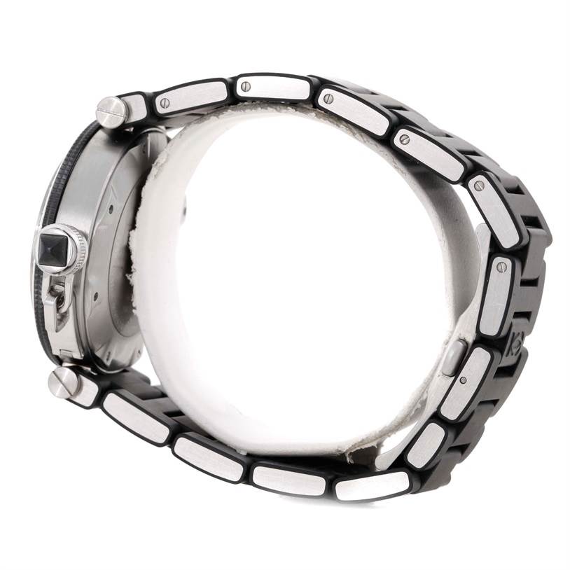 The image shows a side view of the Cartier Pasha W31077U2 Men
s Stainless Steel Black Dial W31077U2 Men
s Stainless Steel Black Dial watch displaying the crown, pushers, case, and the metal bracelet.