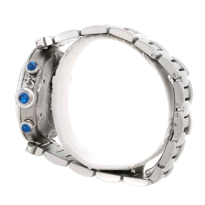This image shows a Cartier Pasha W31030H3 Men
s Stainless Steel Silver Dial W31030H3 Men
s Stainless Steel Silver Dial watch from a side angle, highlighting its crown, pushers, and part of the bracelet.