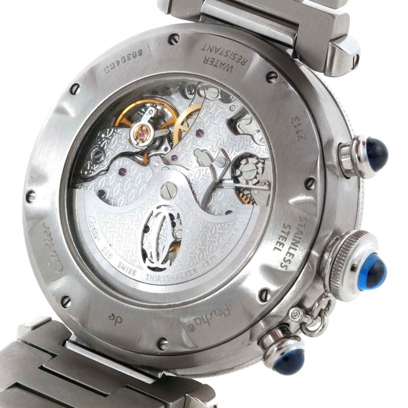 The image shows the back of a Cartier Pasha W31030H3 Men
s Stainless Steel Silver Dial W31030H3 Men
s Stainless Steel Silver Dial watch, displaying its inner mechanical components and stainless steel casing.