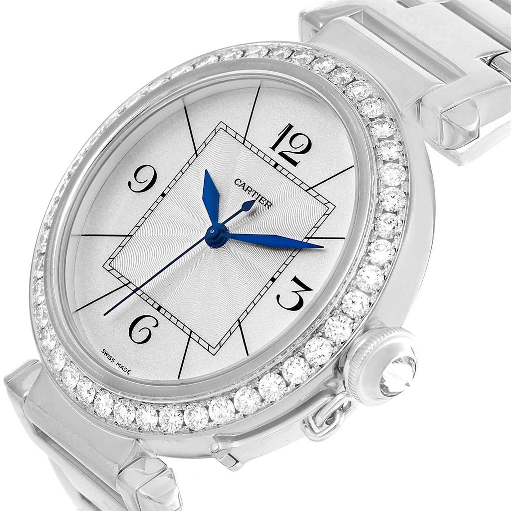The image shows a close-up angle of the Cartier Pasha WJ1202M9 Men's White Gold Silver Dial WJ1202M9 Men's White Gold Silver Dial watch dial, bezel with diamonds, and part of the bracelet.