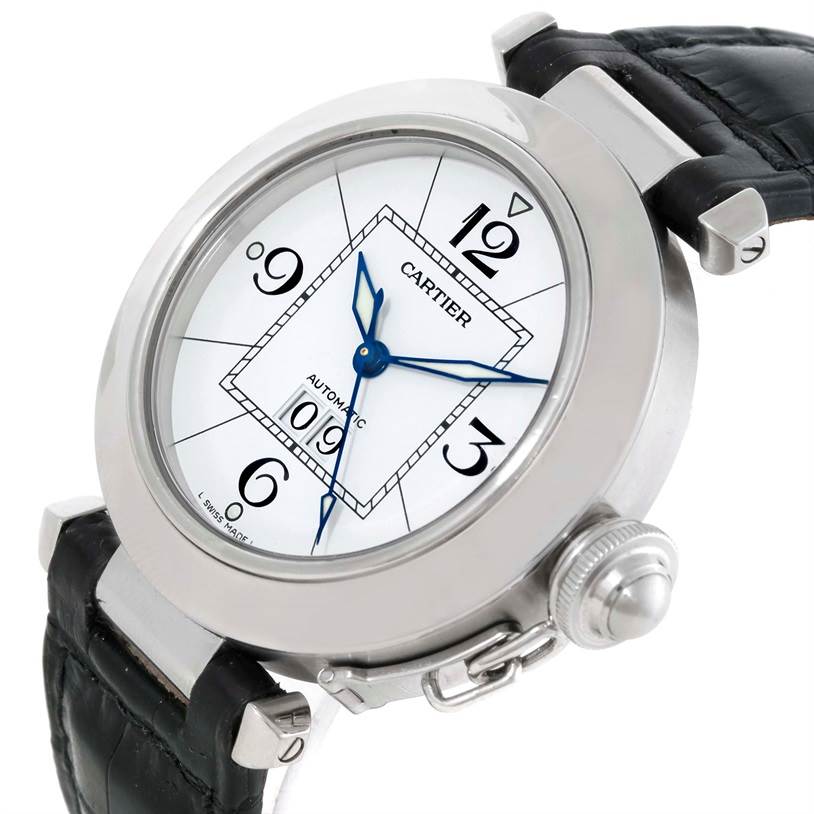 This image shows a Cartier Pasha W31055M7 Men's Stainless Steel Silver Dial W31055M7 Men's Stainless Steel Silver Dial watch at an oblique angle, displaying its dial, crown, and black leather strap.