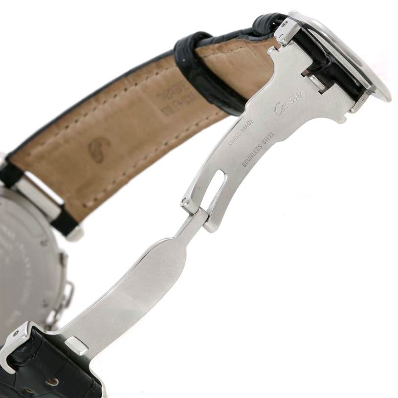 This image shows the open clasp and leather strap of a Cartier Pasha W31055M7 Men's Stainless Steel Silver Dial W31055M7 Men's Stainless Steel Silver Dial watch, highlighting the "Cartier" engraving and "Swiss Made" text.