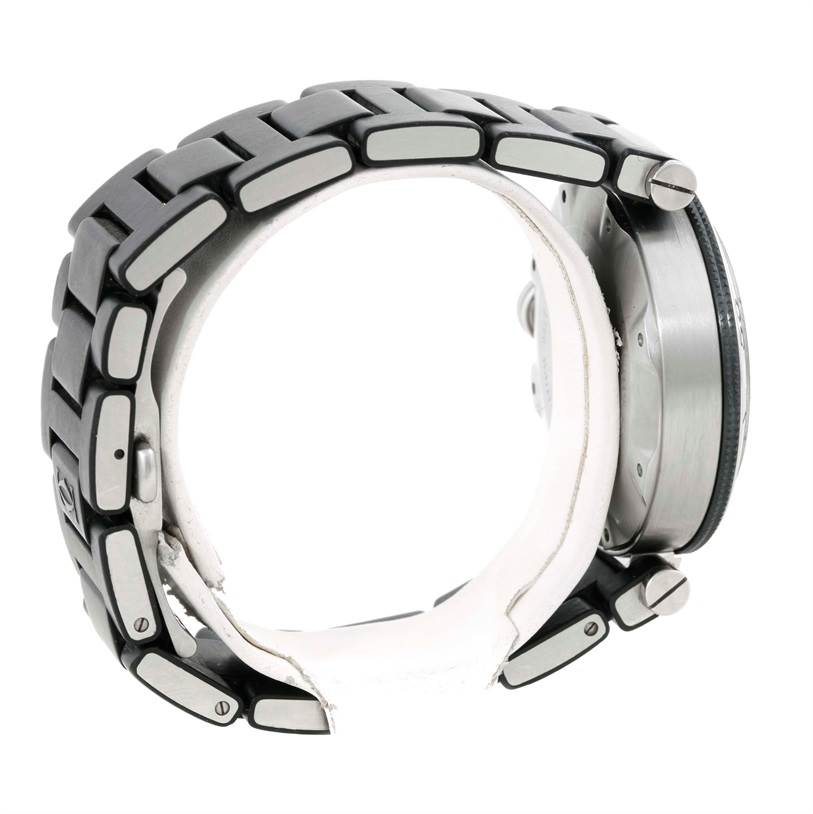 The image shows a side view of the Cartier Pasha W31077U2 Men's Stainless Steel Black Dial W31077U2 Men's Stainless Steel Black Dial model watch, highlighting its metallic bracelet and crown.