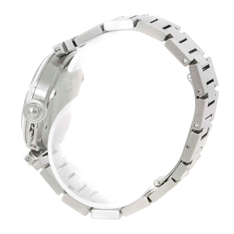 This image shows a side view of the Pasha model by Cartier, highlighting the case, crown, and bracelet.